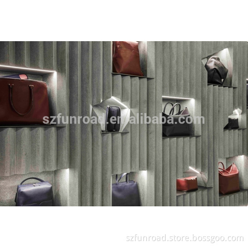 Highend handbag store designs wooden display furnitures with stone finish